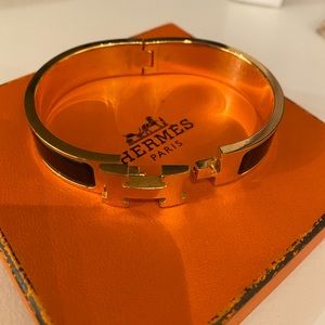 COPY - Hermès Clic Clac black/yellow gold bracelet